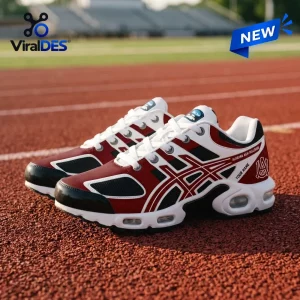 Side view of maroon and white Alabama A&M Bulldogs sneakers with white laces and cushioned soles on a running track.