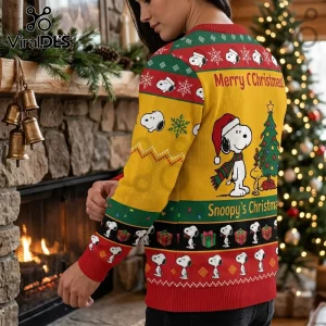 Snoopy Christmas Yellow Ugly Christmas Sweater featuring Snoopy and Woodstock by a tree with red and green patterned trim.