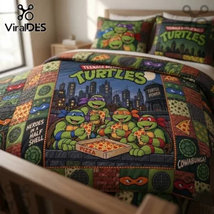 Teenage Mutant Ninja Turtles quilt bedding set featuring the four turtles eating pizza against a night city skyline.