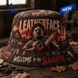 Front view of the Leatherface Welcome To The Slaughter Horror Bucket Hat on a rustic wooden surface.