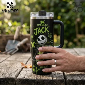 Jack Skellington Not A People Person black 40oz tumbler with green graffiti accents held on a weathered wooden surface.