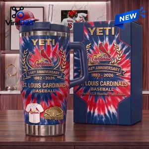 Front view of a YETI tumbler with red and blue tie-dye pattern and St. Louis Cardinals 144th anniversary graphics.