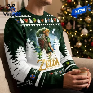 Front view of a green Christmas sweater featuring a character illustration, white trees, and snowflake patterns.