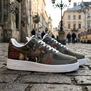 Iron Maiden A Matter of Life and Death 20th Anniversary AF1 sneaker with military green artwork and white rubber sole.
