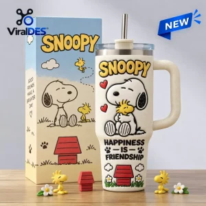 Front view of a white insulated tumbler with a character graphic and the text Happiness Is Friendship.