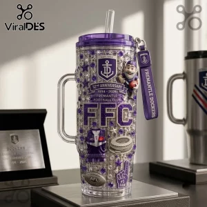 Fremantle Dockers 32nd Anniversary 40oz Tumbler with purple accents, gnome figurine, team logo, and decorative crystals.