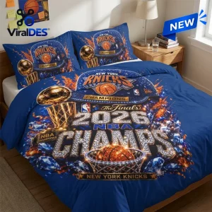 New York Knicks 2026 NBA Champions bedding set featuring a blue comforter and pillows with championship trophy graphics.