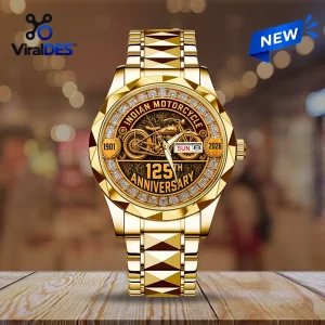 Indian Motorcycle 125th Anniversary Quartz Watch with a gold-tone band, detailed motorcycle dial, and crystal bezel.