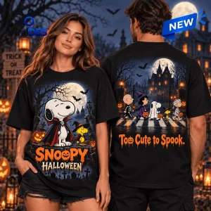 Front and back view of a black shirt featuring Snoopy as a vampire and a group of characters trick-or-treating at night.