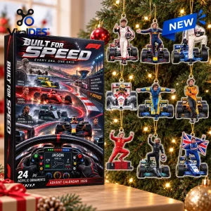 Front view of F1 Racing Legends Christmas Advent Calendar 2026 box alongside hanging ornaments on tree.
