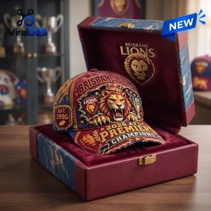 Closeup of Brisbane Lions 2026 AFL Premiers Champions Distressed Cap inside a burgundy gift box.