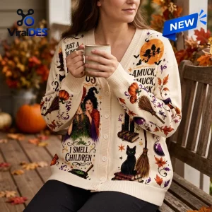 Front view of a cream-colored button-up cardigan featuring Halloween patterns and Hocus Pocus Sanderson Sisters themes.