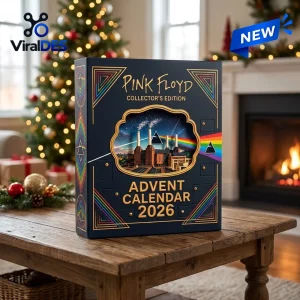 Front view of the Pink Floyd Advent Calendar 2026 on a wooden table with a fireplace and Christmas tree in the background.