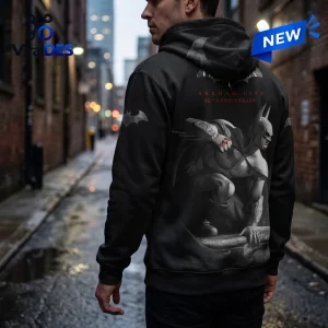 Back view of the Batman Arkham City 15th Anniversary Black Hoodie worn in an alleyway.