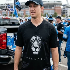 Man wearing a Detroit Lions Villain Black Custom Football Jersey with a lion graphic.