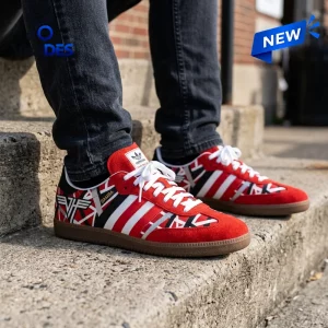 Close-up of Adidas Samba Van Halen Custom Sneakers in red and white on concrete steps.