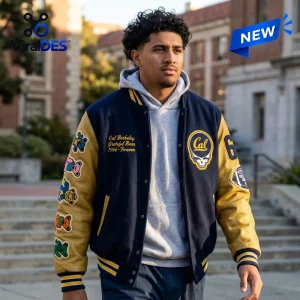 Front view of the California Golden Bears NCAA x Grateful Dead varsity jacket worn with a grey hoodie outside.