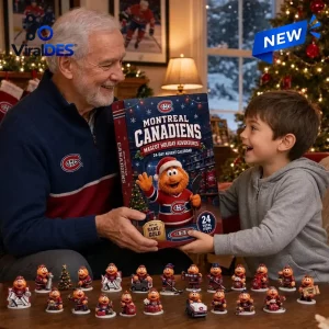 An older man and a young boy holding the Montreal Canadiens Youppi! Mascot Advent Calendar 2026 indoors.