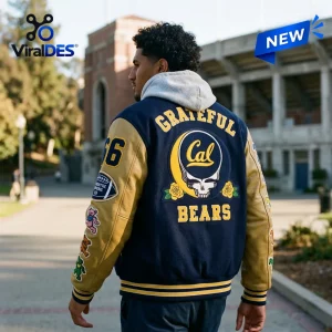 Rear view of a person wearing a California Golden Bears NCAA x Grateful Dead Varsity Jacket outdoors.