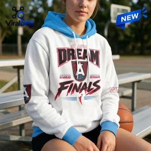 Front view of a person wearing an Atlanta Dream 2026 WNBA Finals white hoodie with blue hood and cuffs while sitting on a bench.