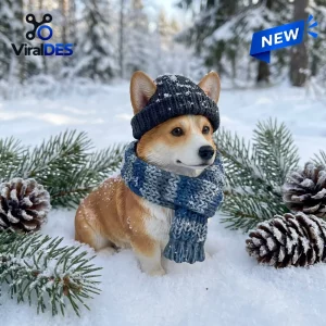 Front view of The Corgi Winter Blind Box Advent Calendar figurine wearing a knit hat and scarf in snow.