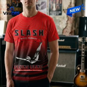 Front view of a red t-shirt with Slash Myles Kennedy World Tour 2027 graphics and text.