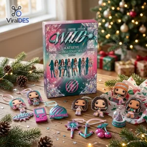 Front view of the KATSEYE World Tour WILD 2026 Advent Calendar box surrounded by holiday decorations.