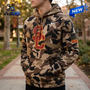 Front view of a person wearing a camouflage hoodie featuring an USC Trojans logo on the chest.