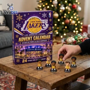 Front view of Los Angeles Lakers 2026 Advent Calendar box on a wooden table with mini figurines.