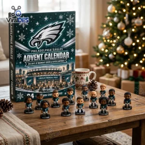 Front view of Philadelphia Eagles mini figures advent calendar box with football player figurines displayed on wooden table.