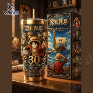 Front view of a gold Stanley tumbler cup with anime character graphics and 30 years of legend text.