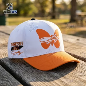 Side angle view of the Tennessee Volunteers Dolly Parton Tribute Cap featuring an orange butterfly and text.