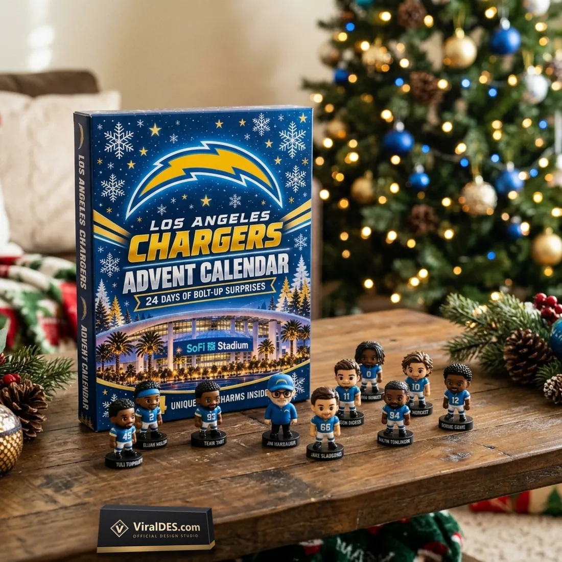 Miniature Los Angeles Chargers player and coach figurines arranged on a wooden table in front of the 2026 Advent Calendar box