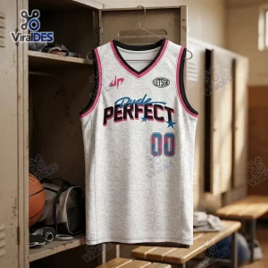 Front view of Dude Perfect Squad Games Tour white basketball jersey hanging in a locker room.