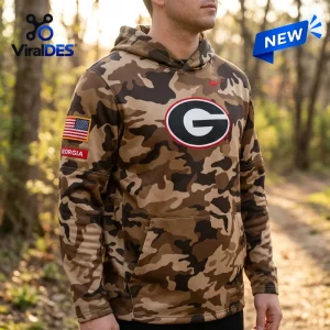 Front view of a person wearing a camouflage University of Georgia 2026 Military Appreciation Camo Hoodie outdoors.