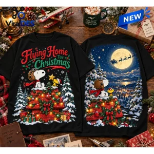 Front and back view of Snoopy Woodstock Flying Home Christmas T-Shirt on rustic wooden table with holiday decor.