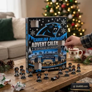 Front view of a Carolina Panthers 2026 Advent Calendar box on a wooden table with miniature figures.