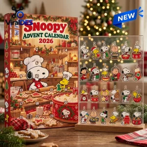 Front view of the Snoopy 2026 Advent Calendar Blind Box alongside a transparent display stand holding character figures.