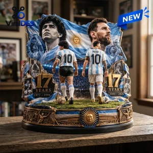 Front view of an Argentina National Football Team Maradona x Messi figurine featuring two players on a stadium base.
