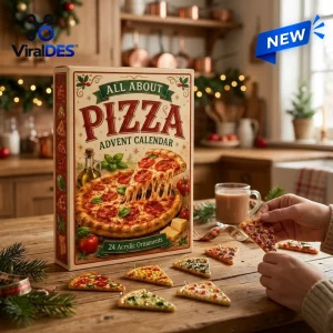 Front view of All About Pizza Advent Calendar 2026 box with miniature slice ornaments on a wooden table.
