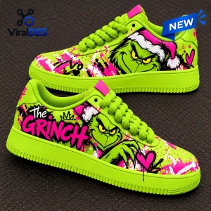 Side view of neon green Air Force 1 shoes featuring graffiti art and character graphics.