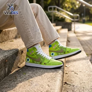 Lifestyle view of Green Monster Eye Custom High Top Sneakers worn sitting on outdoor stone steps.