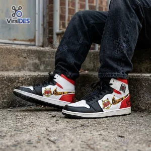 Side view of Slayer Band Air Jordan 1 High Top Sneaker worn with dark jeans.