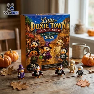 Front view of the Little Doxie Town 2026 Halloween Advent Calendar box with toy figurines on a wooden table.