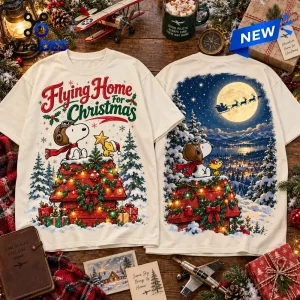 Front and back view of Snoopy Woodstock Flying Home Christmas T-Shirt on a rustic wooden table.