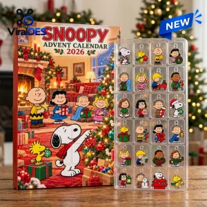 Front view of the Snoopy Peanuts Christmas Advent Calendar featuring a box and a clear tray of small character charms.