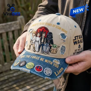 Closeup of a Star Wars 50th Anniversary Distressed Baseball Cap featuring embroidered character graphics.