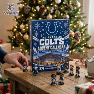 Front view of an Indianapolis Colts 2026 Advent Calendar box on a wooden table with mini player figurines.