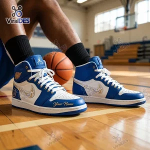 On-court view of blue and white Stephen Curry Air Jordan 1 High Top Sneakers with gold accents.