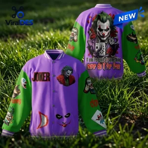 Front and back view of the DC Comics Joker Quote Baseball Jacket in purple and green outdoors on grass.